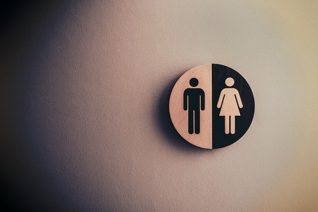 Symbol of men and women in front of a public toilet